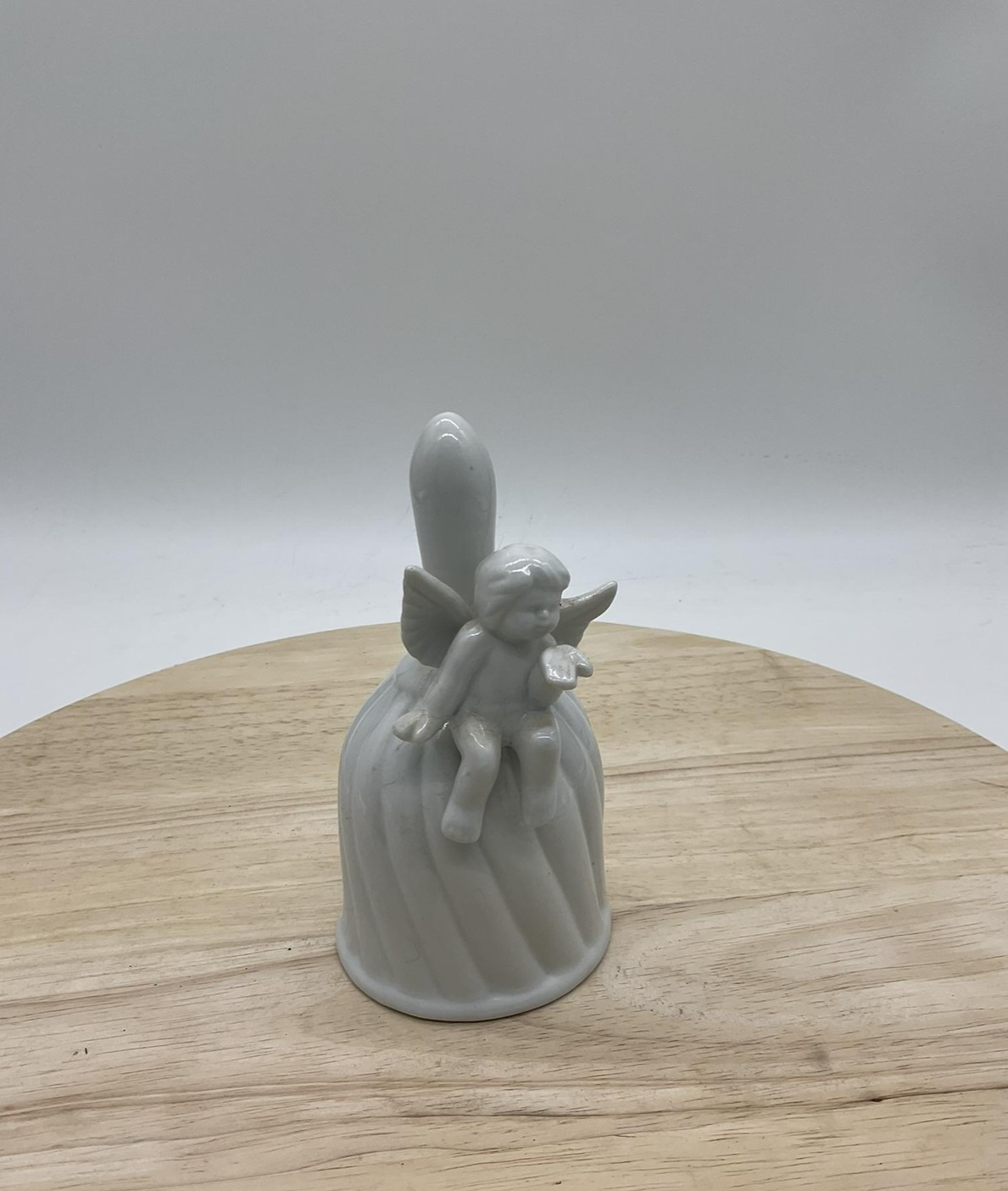White Ceramic Angel Bell Figurine Cherub Sitting On Bell Decorative Collectible
