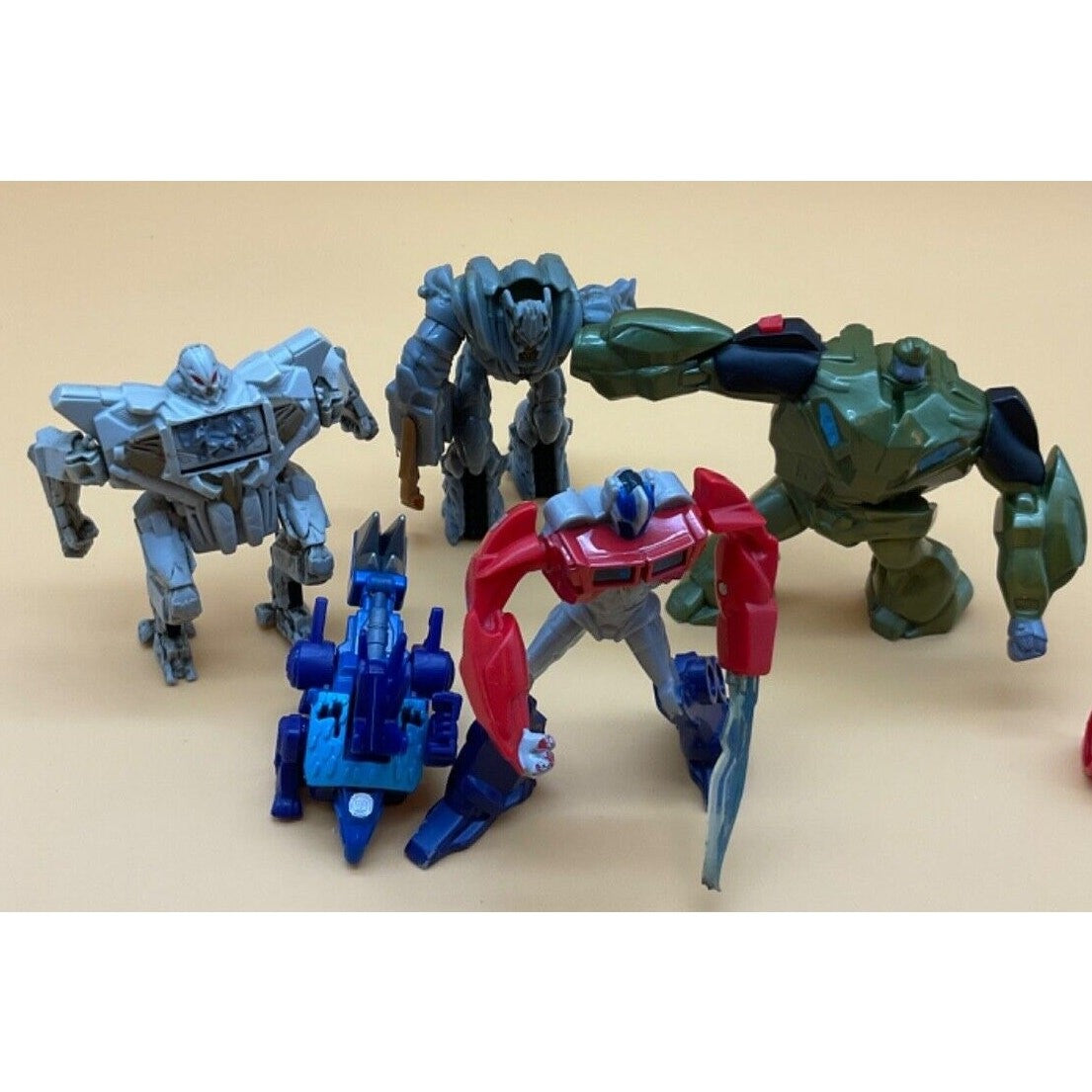 Transformers Lot: Optimus, Bulkhead, Starscream, Megatron + Chase Dinobot Mini